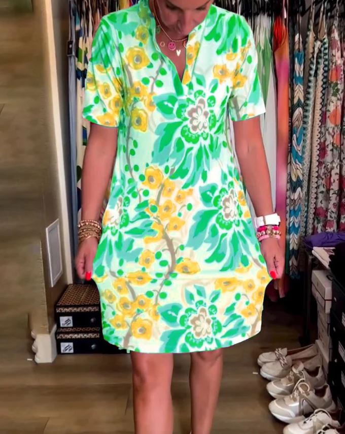 Short-sleeved dress with floral print and V-neck
