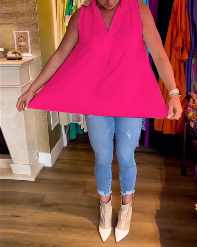 Sleeveless top with ruffles and cuffs