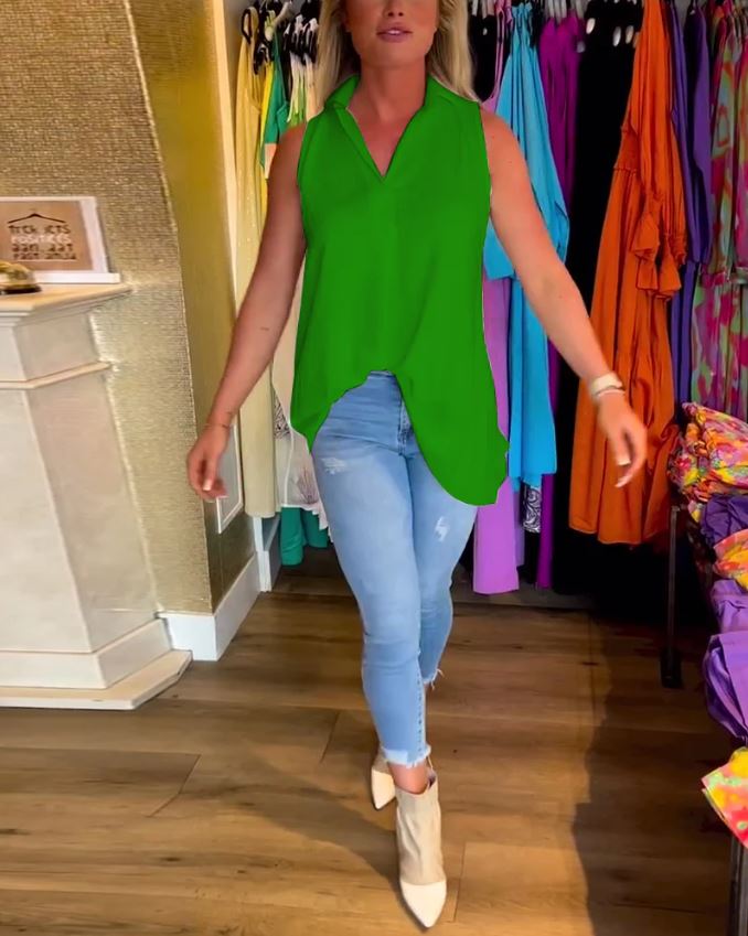 Sleeveless top with ruffles and cuffs