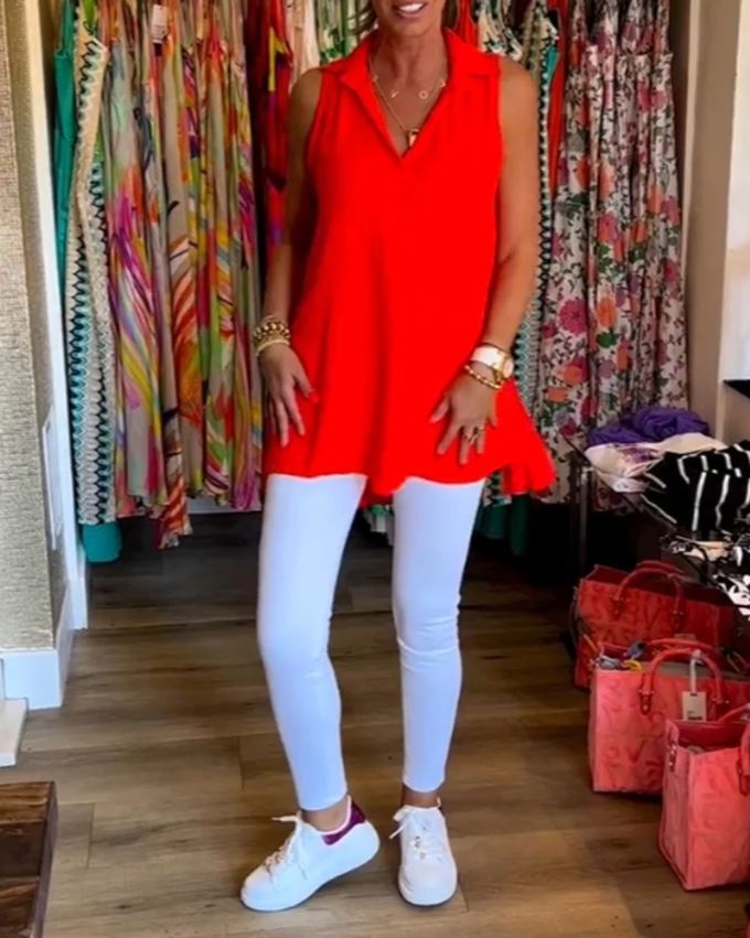 Sleeveless top with ruffles and cuffs