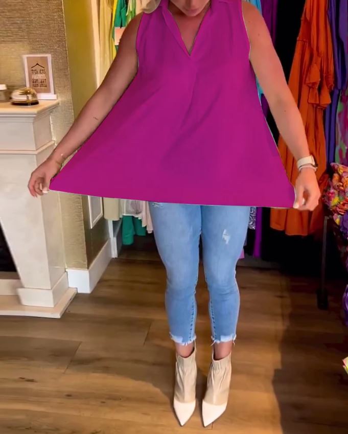 Sleeveless top with ruffles and cuffs