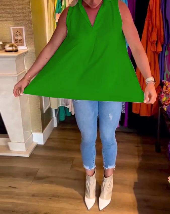 Sleeveless top with ruffles and cuffs