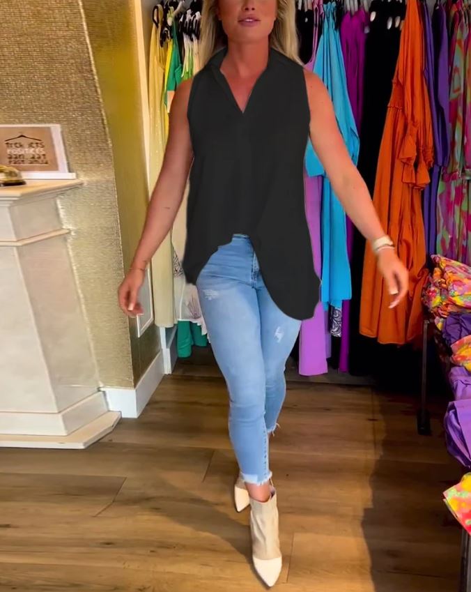 Sleeveless top with ruffles and cuffs
