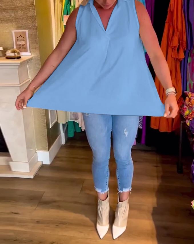 Sleeveless top with ruffles and cuffs